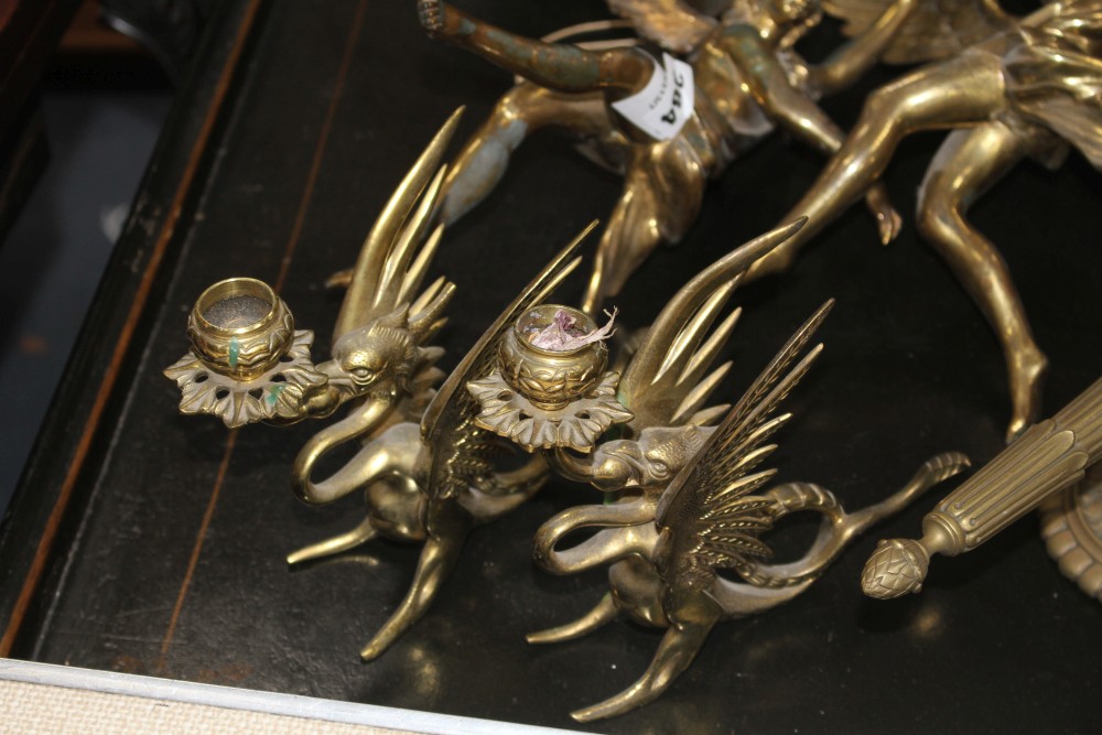 A pair of gilt bronze angel hanging light fittings, height 39cm, a torch wall light, 26cm and a pair of brass dragon chambersticks, 16c